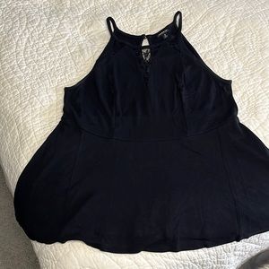 Torrid swing peplum-style top. SZ 0. Black. EUC